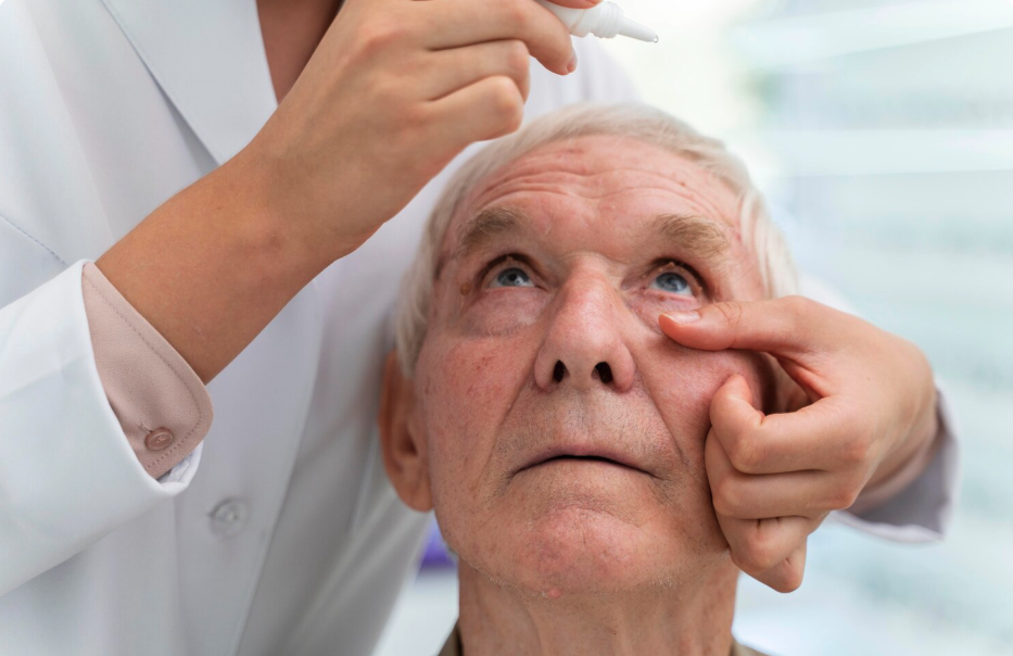 Augenarzt & Augenlasern Frankfurt dr.vision Dr. Putting Eye Drops to a patients eye.